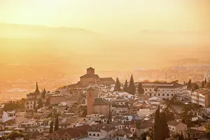 Granada Prints: Atmospheric sunset above historic Albaicin and Iglesia de San Cristobal