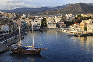 Agios Nikolaos Prints: Attractive harbour and town backed by mountains, from Mirabello Bay, Agios Nikolaos
