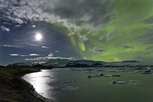 The Aurora Borealis (Northern Lights) captured in the night sky over Jokulsarlon glacial lagoon on the edge of the Vatnajokull National Park, during winter, South Iceland, Iceland, Polar Regions
