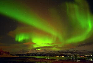 Ethereal Gallery: Aurora borealis (Northern Lights) seen over the Lyngen Alps, from Sjursnes, Ullsfjord, Troms