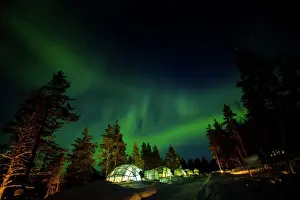 Glowing Prints: Aurora Borealis (the Northern Lights) over Kakslauttanen Igloo West Village, Saariselka