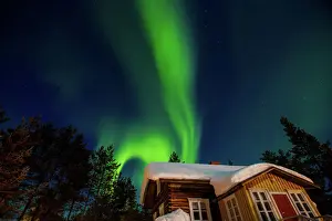 Glowing Prints: Aurora Borealis (the Northern Lights) over Kakslauttanen Igloo West Village, Saariselka