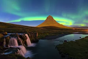 Landscapes Collection: Aurora (Northern Lights) over a moonlit Kirkjufell Mountain, Snaefellsnes Peninsula