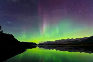 Swirling Prints: Aurora (Northern Lights) reflected in Lower Kananaskis Lake