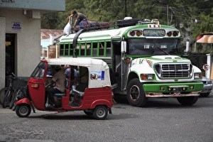 Images Dated 28th November 2007: Auto rickshaw and public bus, Panajachel, Lake Atitlan, Guatemala, Central America
