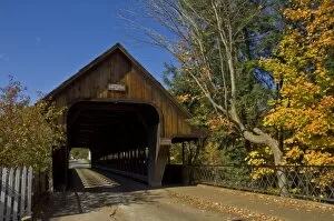 Autumn fall colours around traditional timber covered bridge (Middle Bridge)
