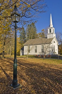 Images Dated 9th October 2008: Autumn fall colours around traditional white timber clapperboard church