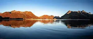 Svolvaer Prints: Autumn sunrise over mountains and coastal village of Sildpollnes