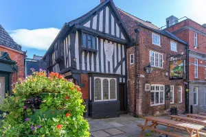 Landscaping Prints: Autumn view of Ye Royal Oak public house with colorful flowers in Chesterfield