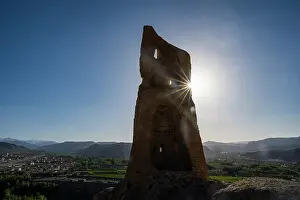 Bamiyan Prints: Backlight shines through the ruins of the City of Screams in Bamiyan