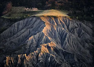 Cherry Tree Prints: Badlands at sunrise with cherry tree in blossom, Emilia Romagna, Italy, Europe