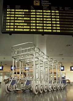 Trolley Prints: Baggage trolleys in departures area, Ibiza Airport, Spain, Europe
