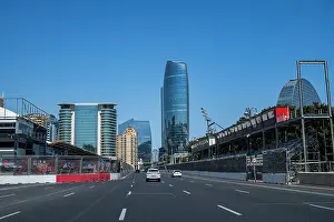 Vehicles Prints: Baku showcases modern architecture and high rise buildings along a clear road on a sunny day