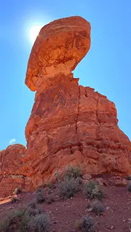 Large Prints: Balanced Rock stands tall against the blue sky under the sun in Arches National Park in Utah