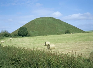 Local Famous Place Prints: Baled hay in field below Silbury Hill, Wiltshire, England, United Kingdom, Europe