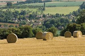 Harvest Prints: Bales of hay with Chipping Campden beyond, from the Cotswolds Way footpath