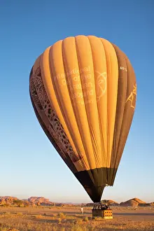 Excitement Prints: Balloon deflating after Hot air balloon flight over Hegra site with Hero Balloon Flights Saudi Operator