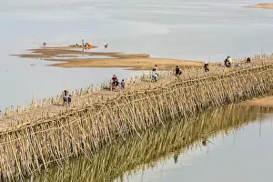 Phnom Penh Prints: Bamboo bridge along the Mekong River near the capital city of Phnom Penh