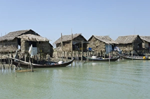 Huts Prints: Bamboo huts and boats along a waterway, Irrawaddy delta, Myanmar (Burma), Asia