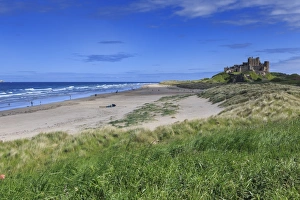 10th Century Prints: Bamburgh Castle across the dunes, early summer afternoon, Northumberland, England