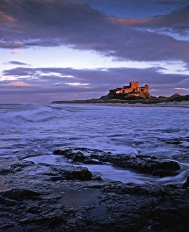 Evening Glow Prints: Bamburgh Castle at dusk, Northumberland, England