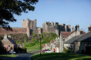 Bamburgh Castle and village of Bamburgh, Northumberland, England, United Kingdom, Europe
