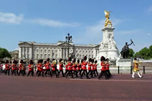 Protection Gallery: Band of the Coldstream Guards marching past Buckingham Palace during the rehearsal for Trooping