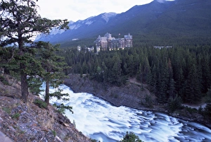 Banff, the Bow Falls and prestigious Banff Springs Hotel, at dusk, Banff National Park Banff, the Bow Falls and prestigious Banff Springs Hotel, at dusk, Banff National Park