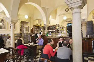 Bars Prints: Bar Giralda (Calle Mateos Gago 1) set in Moorish bathouse