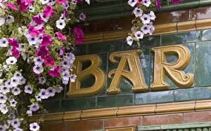 Images Dated 12th September 2006: Bar sign and flowers, Temple Bar, Dublin, Republic of Ireland, Europe