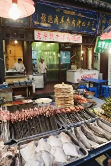 Barbeque food at a street market in the Muslim area of Xian, Shaanxi Province