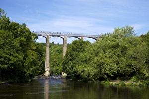 Barge and pedestrians on the Pontcysyllte Aqueduct, UNESCO World Heritage Site