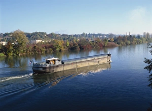 Barge Prints: A barge on the River Seine at Bois le Roi, Ile de France, France, Europe