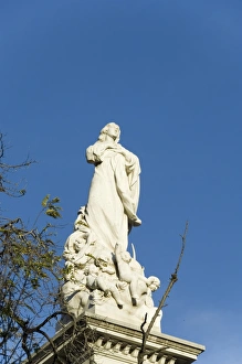 Santa Cruz Prints: Baroque column and statue celebrating the survival
