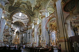 The Baroque interior of St. Nicholas Church in Mala Strana, Prague, Czech Republic
