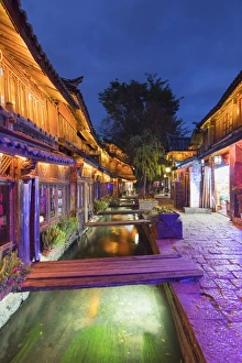 Yunnan Prints: Bars and restaurants along canal at dusk, Lijiang, UNESCO World Heritage Site, Yunnan