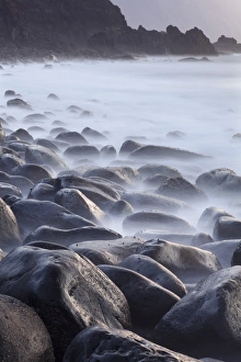 El Hierro Prints: Basalt boulders in the ocean, El Golfo