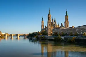 Aragon Prints: Basilica del Pilar Cathedral with stone bridge crossing Ebro River