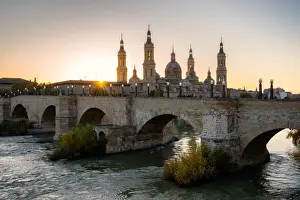 Basilica del Pilar Cathedral with stone bridge crossing Ebro River, Zaragoza, Aragon, Spain, Europe