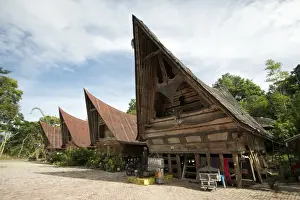 Samosir Island Prints: Batak Toba village houses with high ended roof and tribal carvings