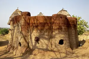 Dirt Prints: Batammariba building in a Koutammakou village in North Togo, West Africa, Africa