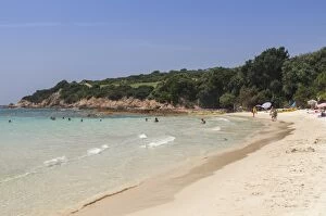 Images Dated 10th July 2010: Bathers on sandy beach surrounded by turquoise sea and golf course, Sperone, Bonifacio