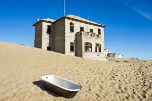 Luderitz Prints: Bathtub standing in the desert, old diamond ghost town, Kolmanskop (Colemans Hill)