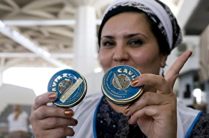 Images Dated 5th August 2009: Bazari woman selling caviar, Central Bazaar, Ashgabad, Turkmenistan, Central Asia, Asia