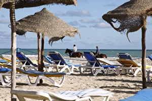 Parasols Prints: Beach scene on the Mediterranean coast in the tourist zone, Djerba Island
