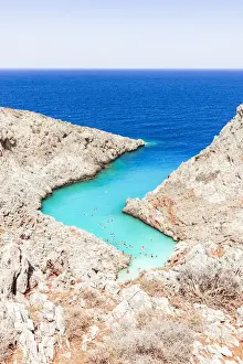 Beach of Seitan Limania washed by turquoise sea nestled inside rock canyons