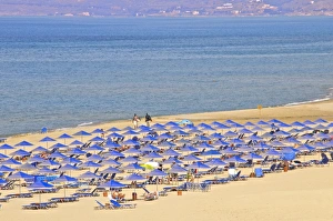 Sun Shades Prints: Beach and sunshades on beach at Giorgioupolis, Crete, Greek Islands, Greece, Europe