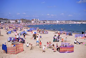 Crowded Prints: The beach, Weymouth, Dorset, England, United Kingdom, Europe