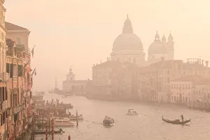 Beautiful Grand Canal, winter fog, morning golden light, Santa Maria della Salute, Venice
