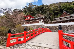 Aesthetics Prints: Beautiful red bridge at Buddhist temple Ryuan-ji at Minoh National Park near Osaka